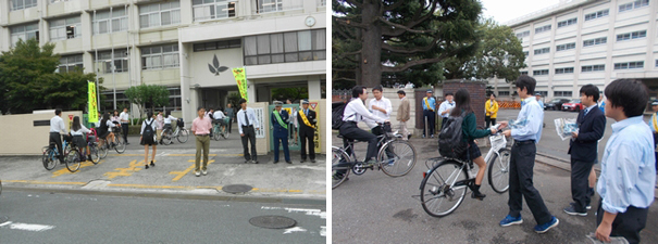 高校の前で自転車通学の生徒に交通マナーについて声掛けをしている様子の写真