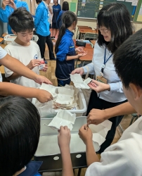 写真：区長の訪問の様子